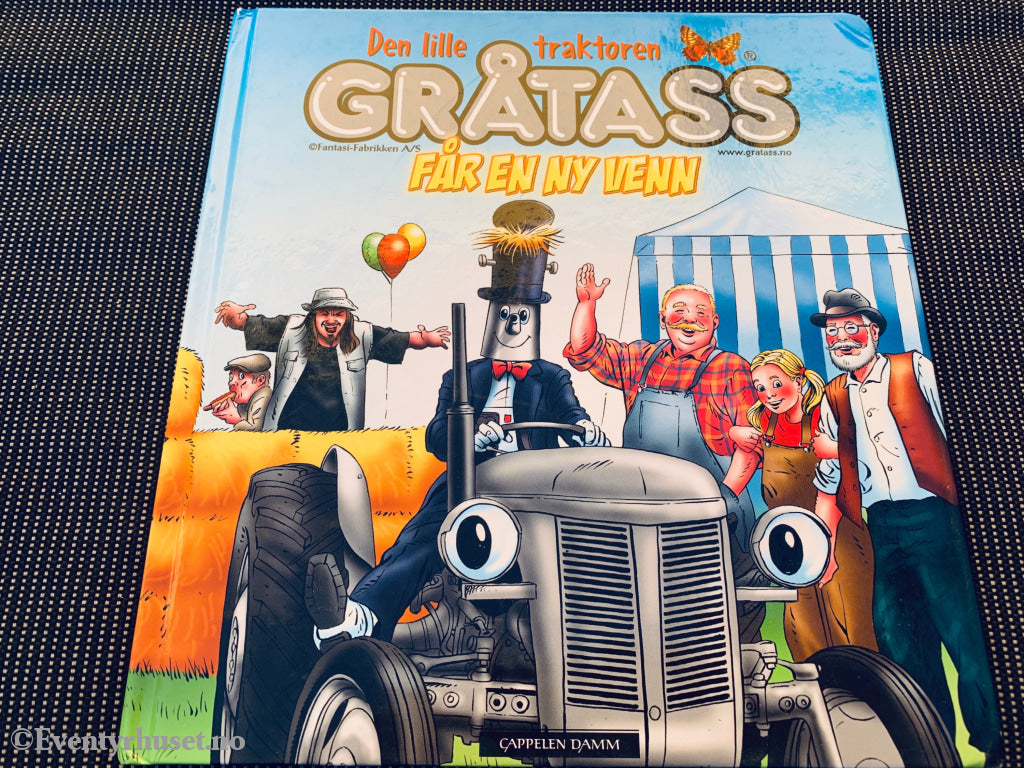 Den lille traktoren Gråtass får en ny venn. Barnebok.