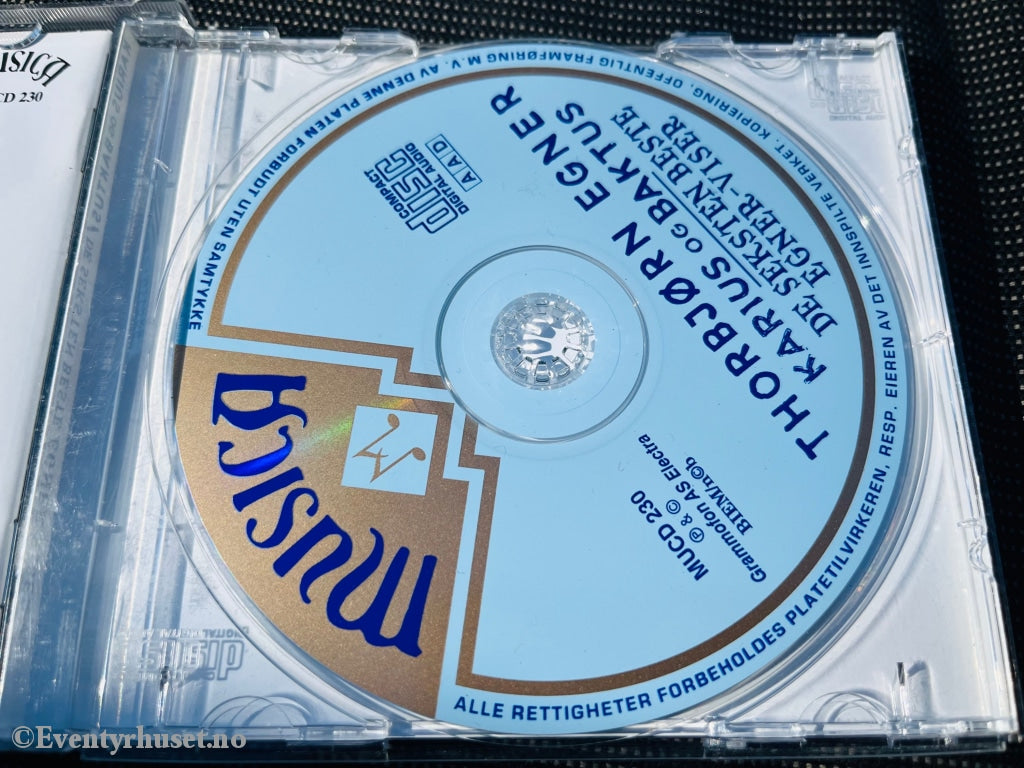 Thorbjørn Egner. 1993. De Seksten Beste Egner-Viser Pluss Karius Og Baktus. Cd (Blå). Lydbok