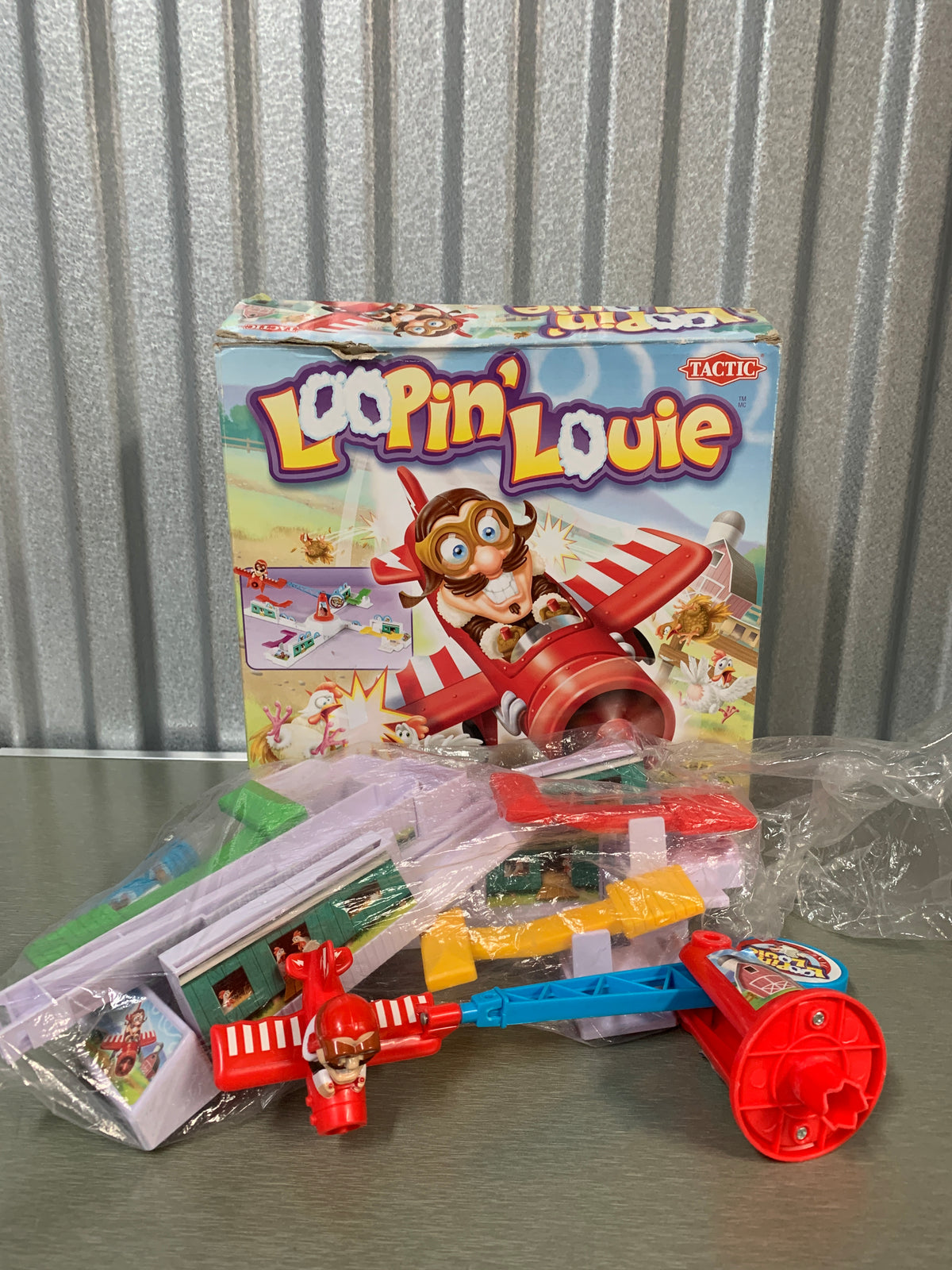Tactic Loopin' Louie – actionspill med eske