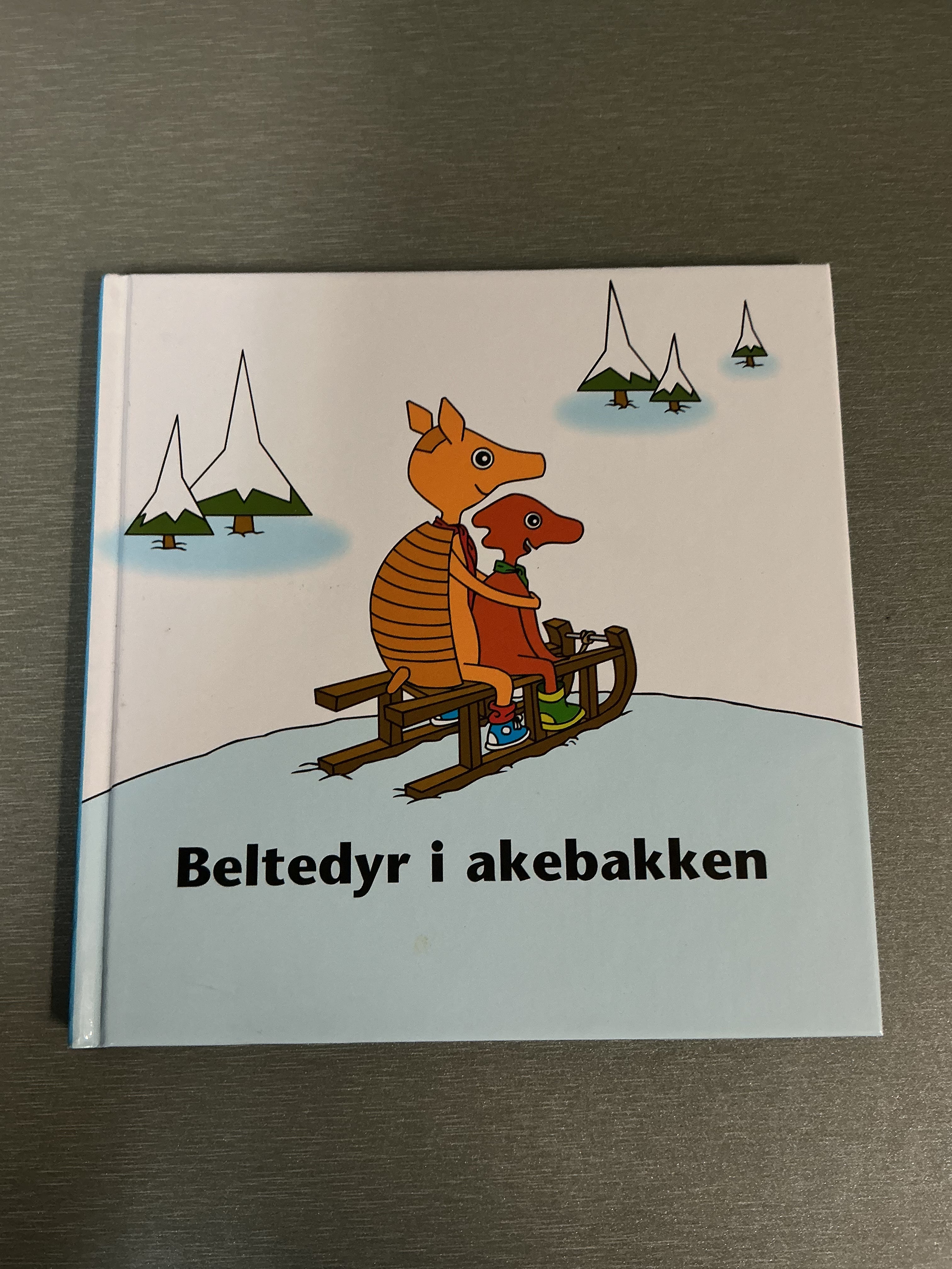 Trygg Trafikk - Beltedyr i akebakken. Bok.