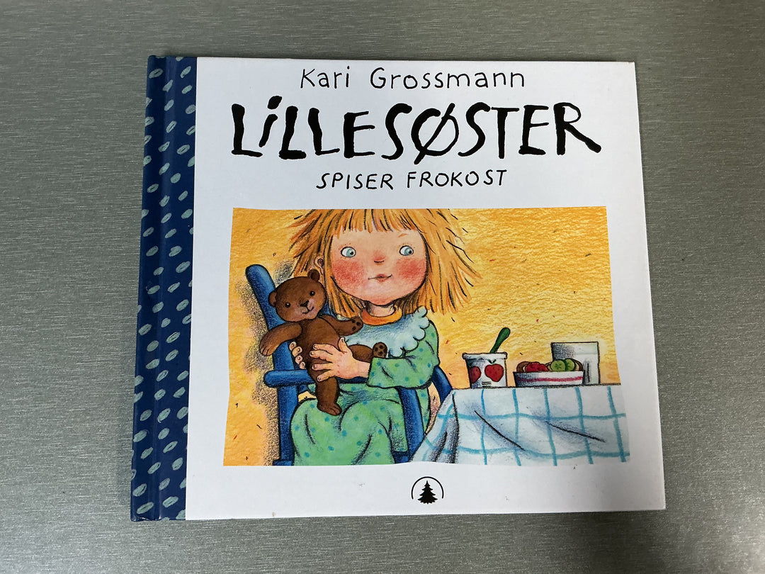 Kari Grossmann - Lillesøster spiser frokost. Bok.