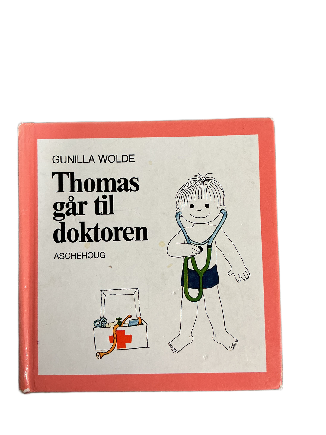 Gunilla Wolde. 1990. Thomas går til doktoren. Bok.
