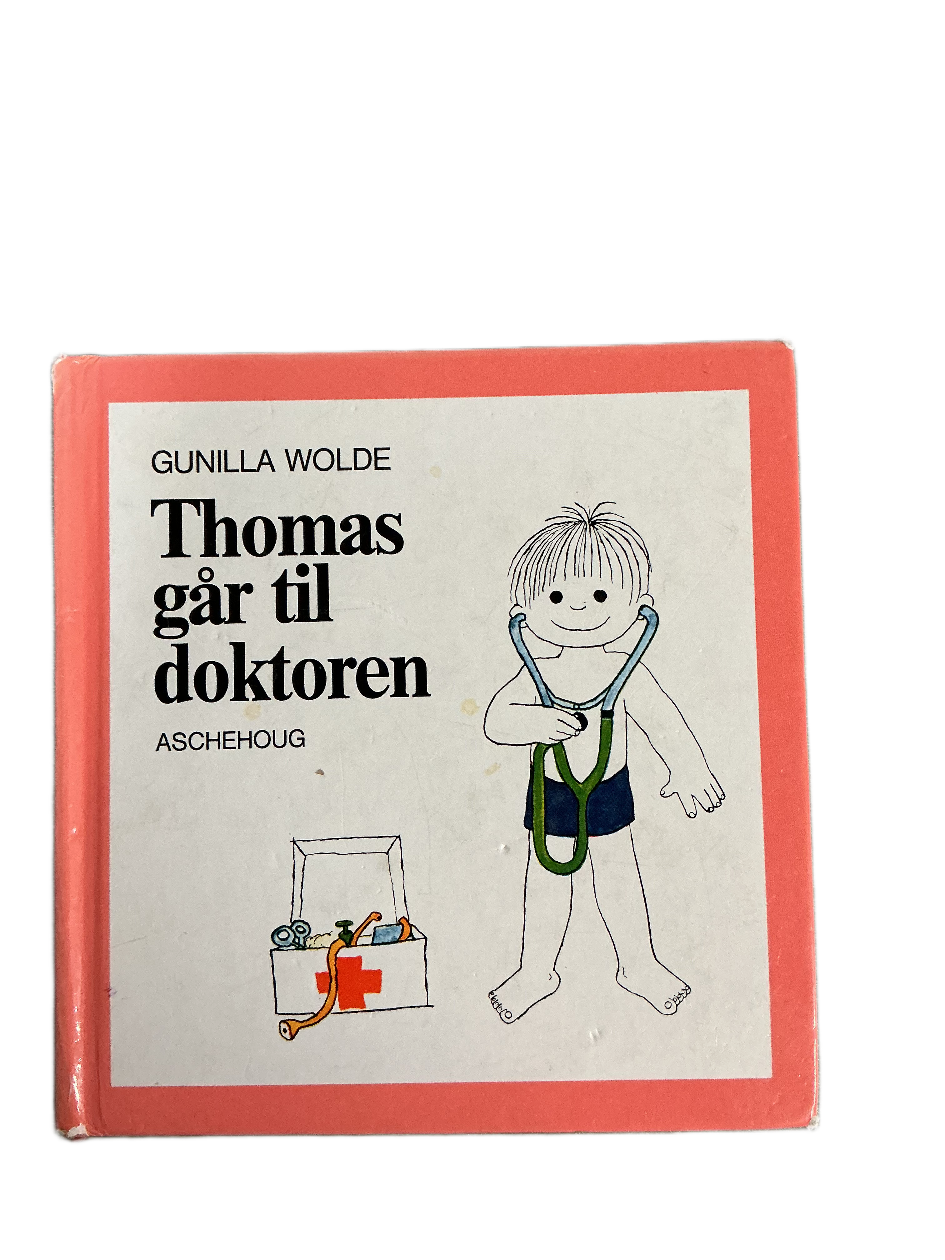 Gunilla Wolde. 1990. Thomas går til doktoren. Bok.