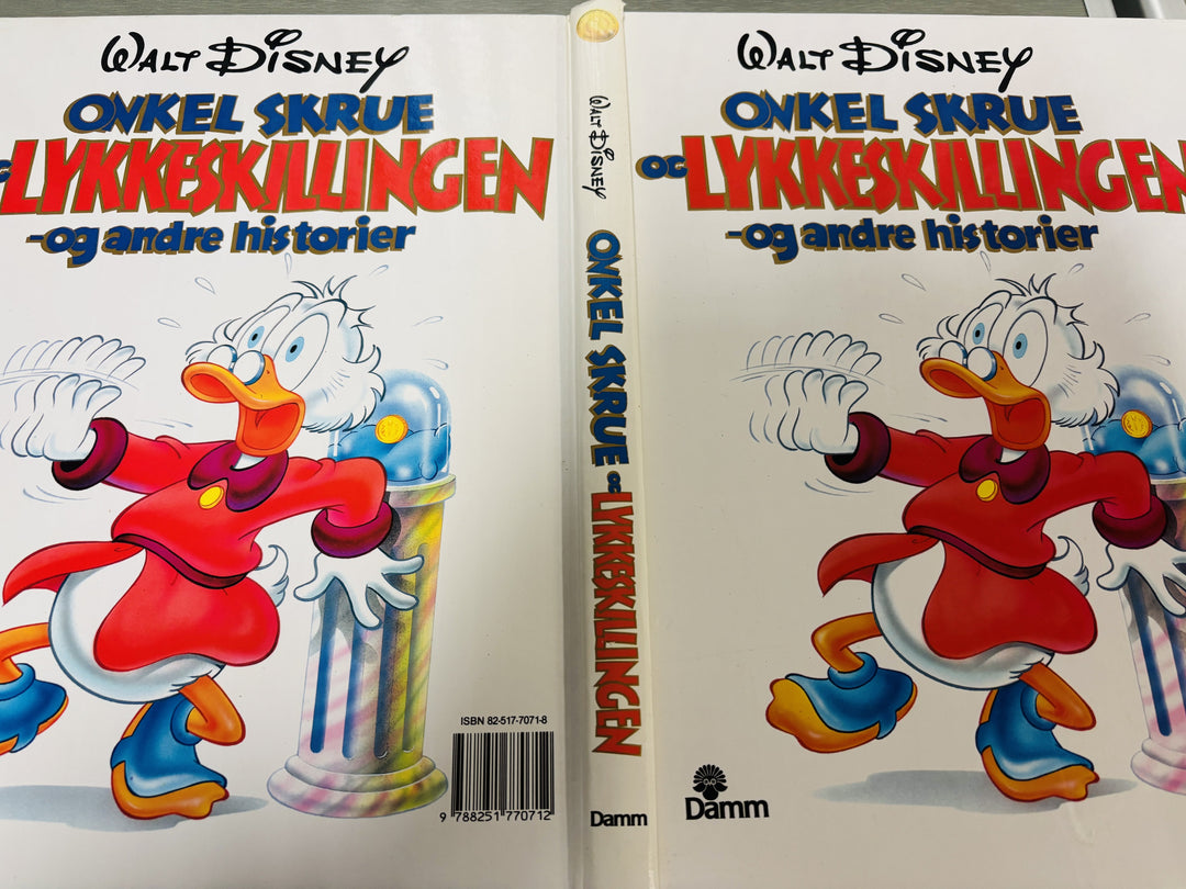 Walt Disney. 1988. Onkel Skrue og lykkeskillingen og andre historier. Bok.