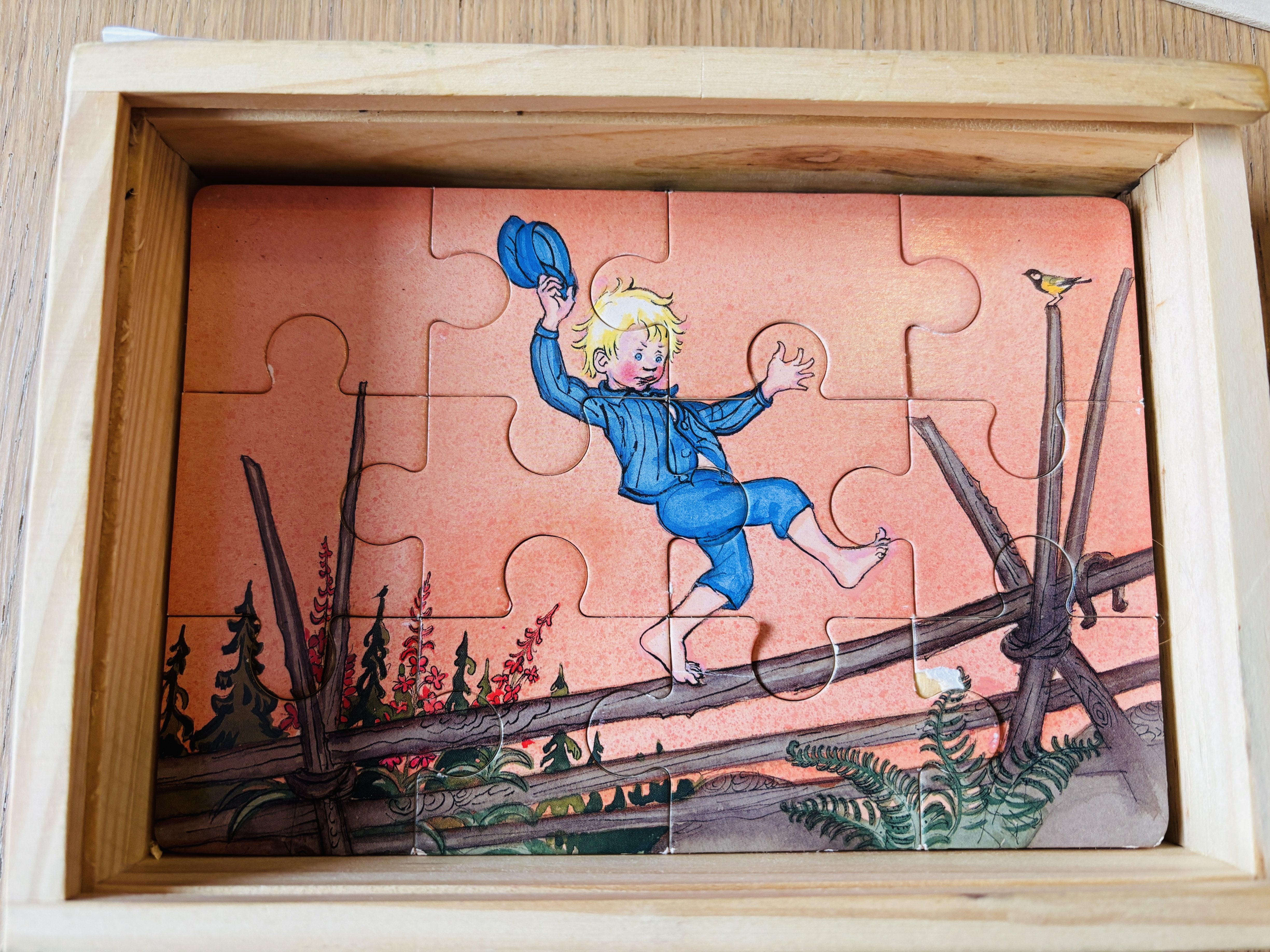 Trepuslespill – Gutt på gjerde