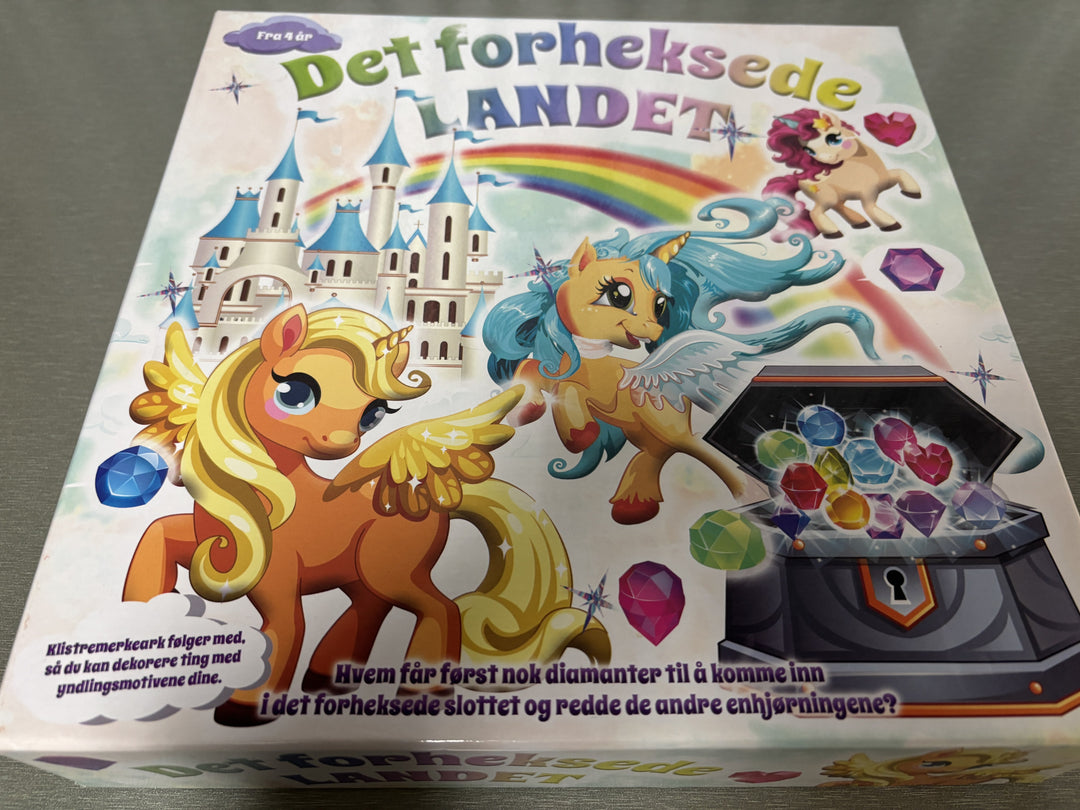 Det forheksede landet. Brettspill.