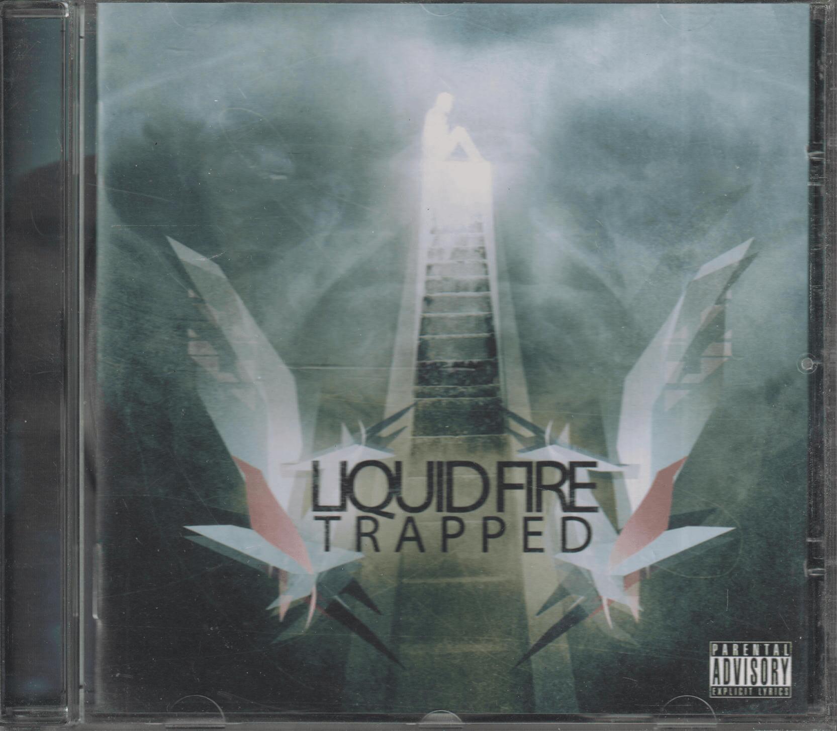 Liquid Fire - Trapped (2007). CD.