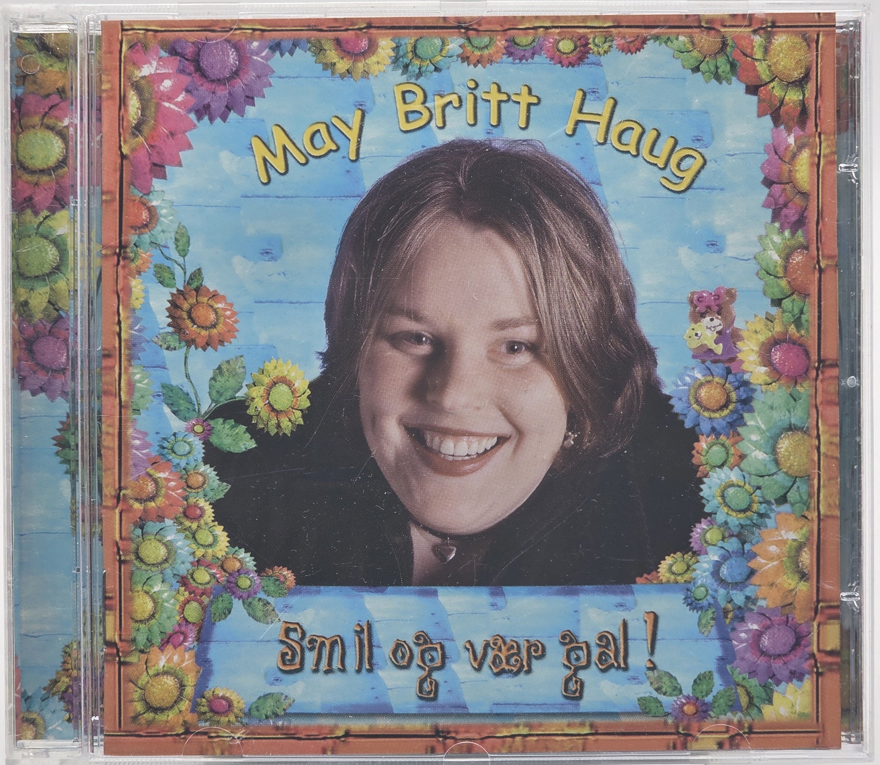 May Britt Haug – Smil og vær glad!. 2000. CD.