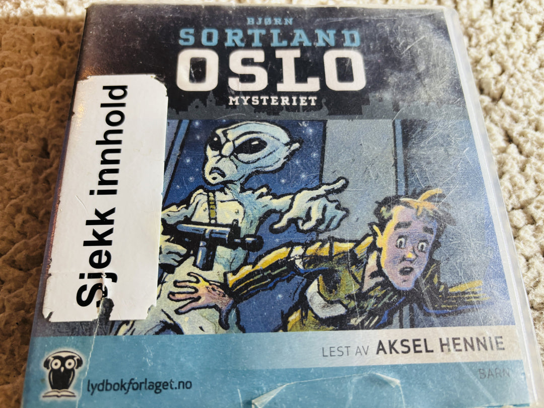 Bjørn Sortland. 2012. Oslo-mysteriet. Lydbok på CD (fra bibliotek, pene disker).