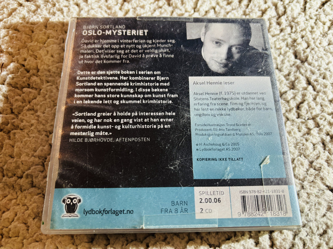 Bjørn Sortland. 2012. Oslo-mysteriet. Lydbok på CD (fra bibliotek, pene disker).