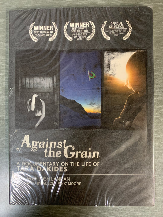 Against the Grain: A Documentary on the Life of Tara Dakides (2008). DVD. Ny i plast!