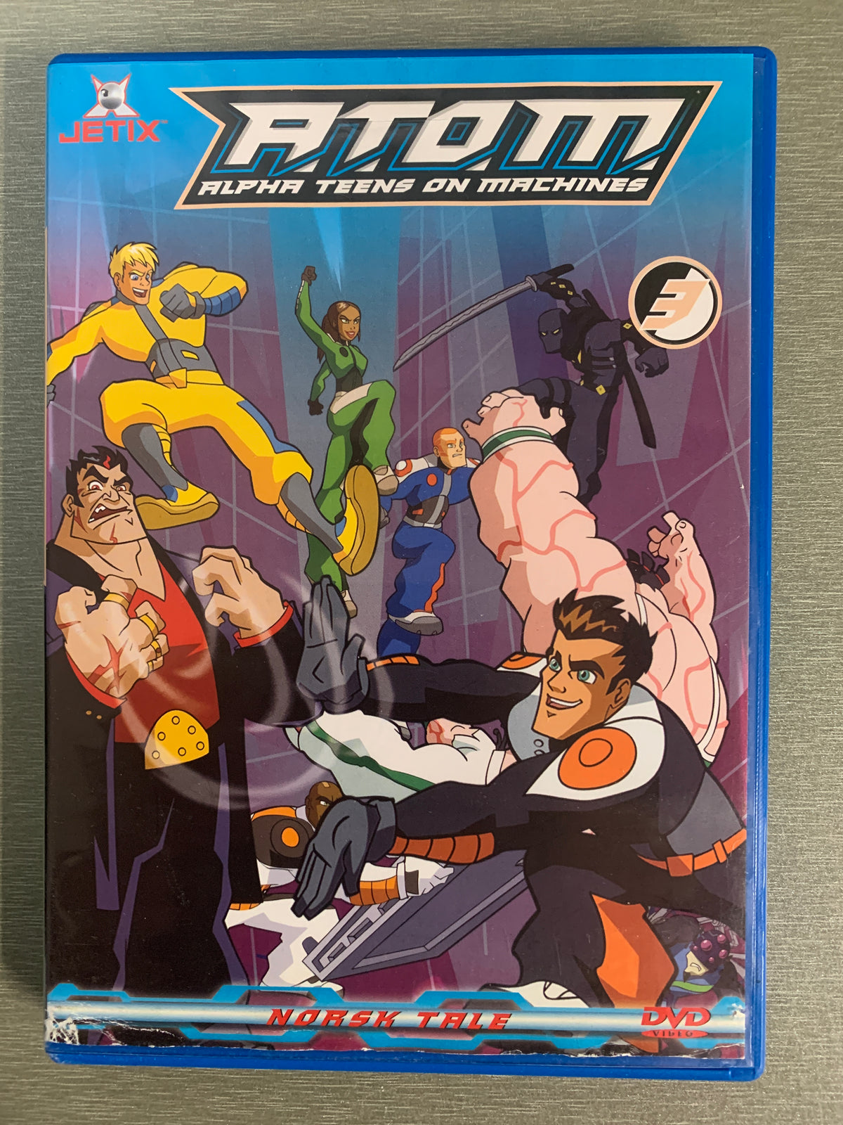 A.T.O.M. – Alpha Teens on Machines 5. DVD.