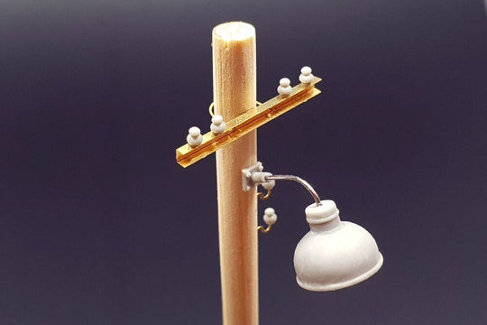 Lamps and telegraph insulators