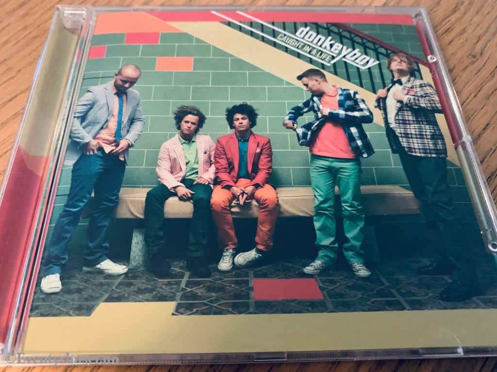 Donkeyboy. 2009. Caught in a Life. CD.