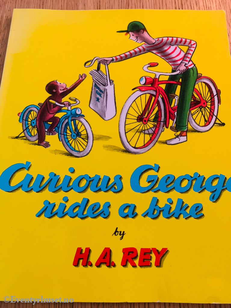 H. A. Rey. Curious George Rides A Bike (Nysgjerrige-Nils). Hefte. Hefte