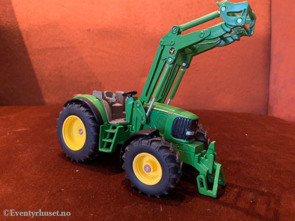 John Deere 6820 traktor med frontlaster.