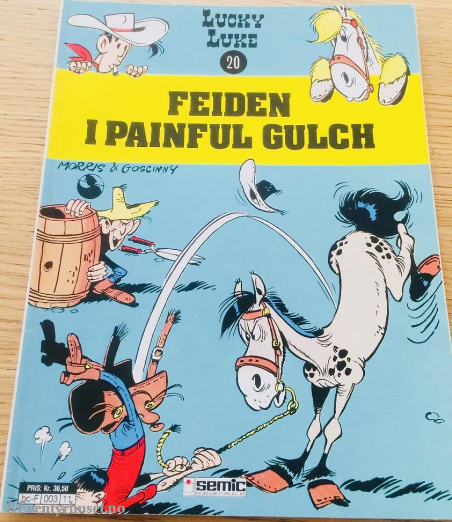 Lucky Luke 20. Feiden I Painful Gulch. 1977/84. Tegneseriealbum