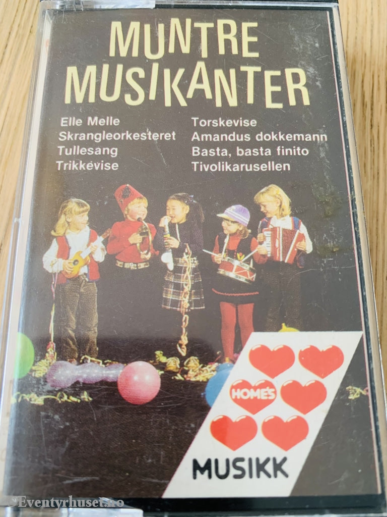 Muntre Musikanter (Homes). Kassett. Kassett (Mc)