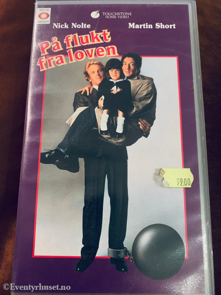 På flukt fra loven. VHS.