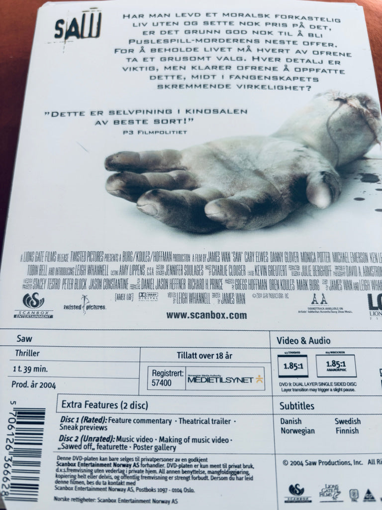 Saw. DVD slipcase. DVD