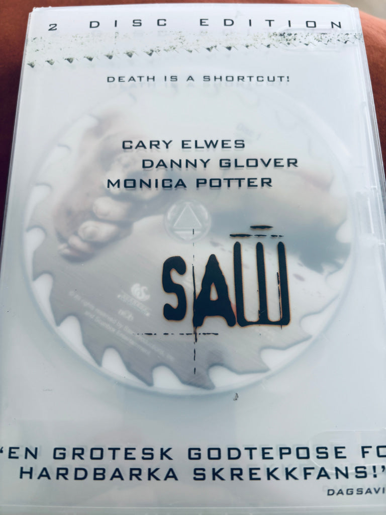 Saw. DVD slipcase. DVD