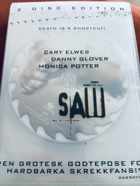 Saw. DVD slipcase. DVD