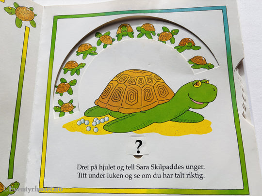 Tell dyrene! Drei på hjulene – Titt under lukene – Tell ungene. 2005. Barnebok.