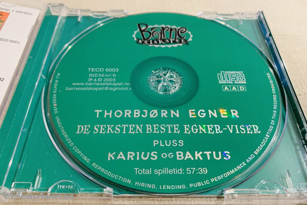 Thorbjørn Egner. 2003. De Seksten Beste Egner-Viser Pluss Karius Og Baktus. Cd. Lydbok